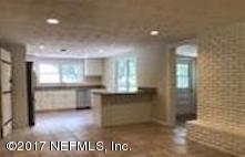 2055 Powell Road St. Augustine, FL 32084 - Photo 3 of 4 a view of kitchen with refrigerator and window