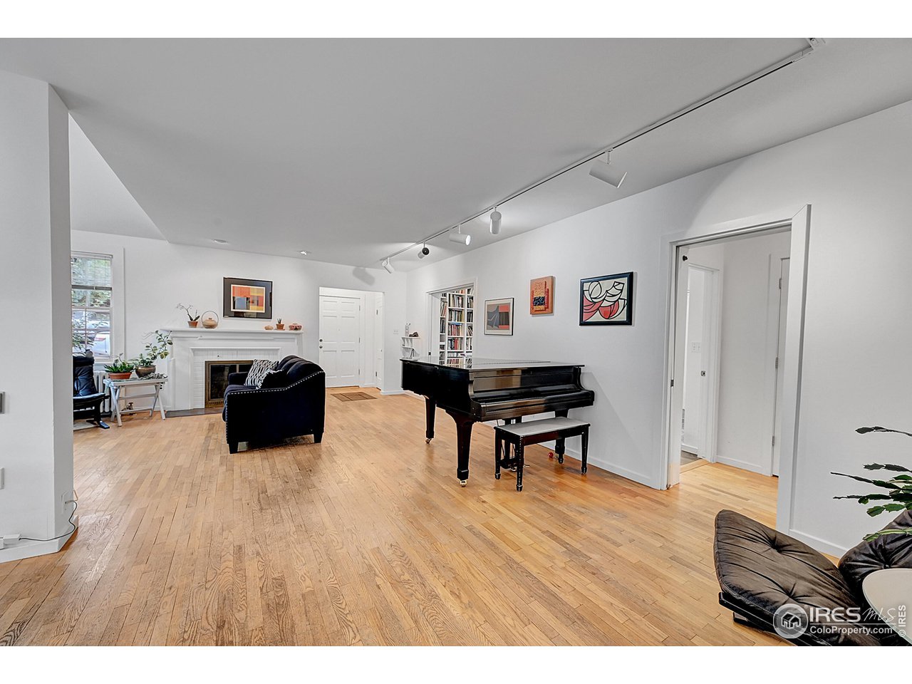 626 14th Street Boulder, CO 80302 - Photo 7 of 32 a living room with furniture and a wooden floor