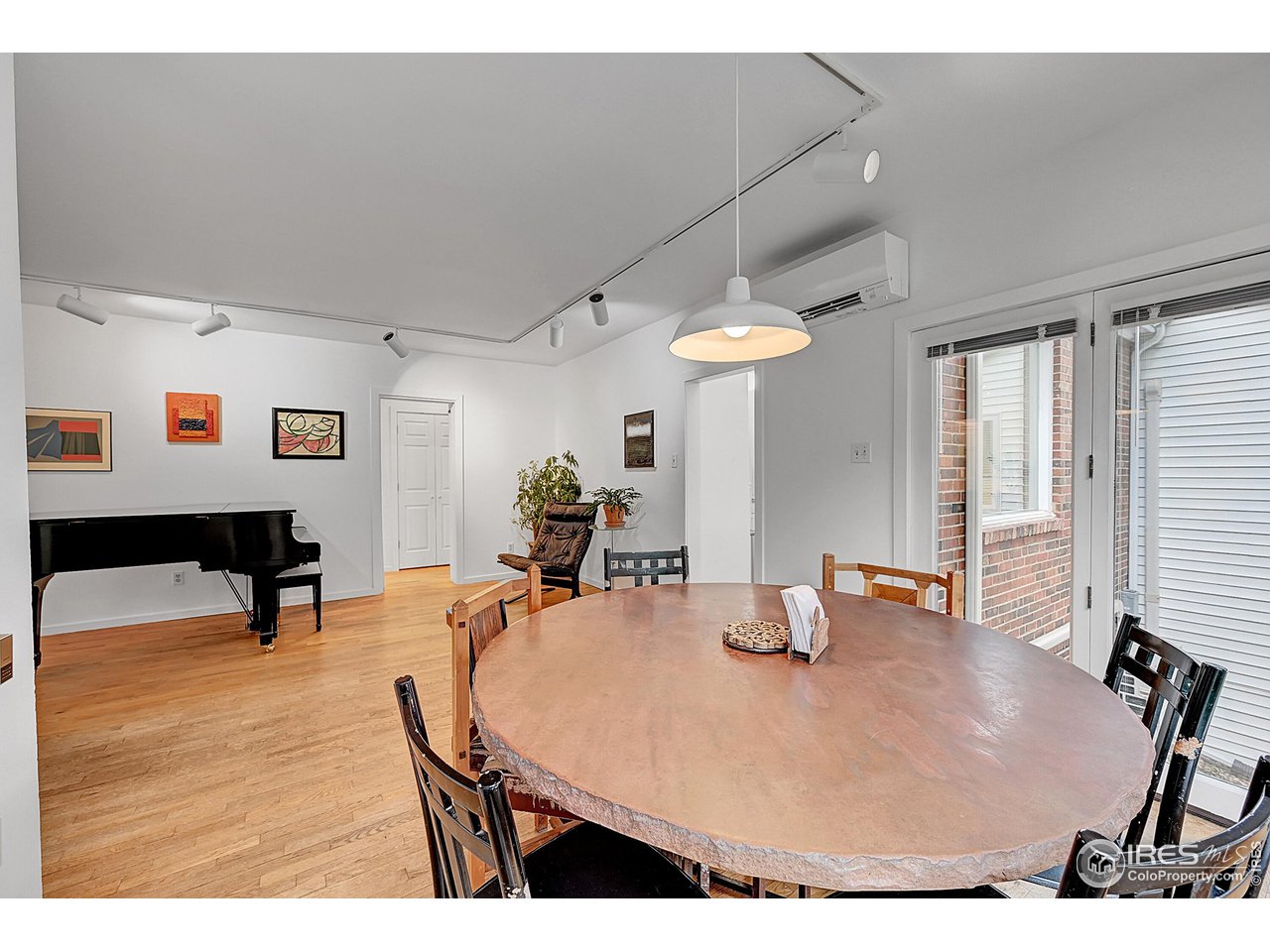 626 14th Street Boulder, CO 80302 - Photo 10 of 32 a room with table and chairs