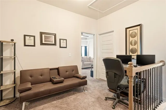 a work room with furniture and a window