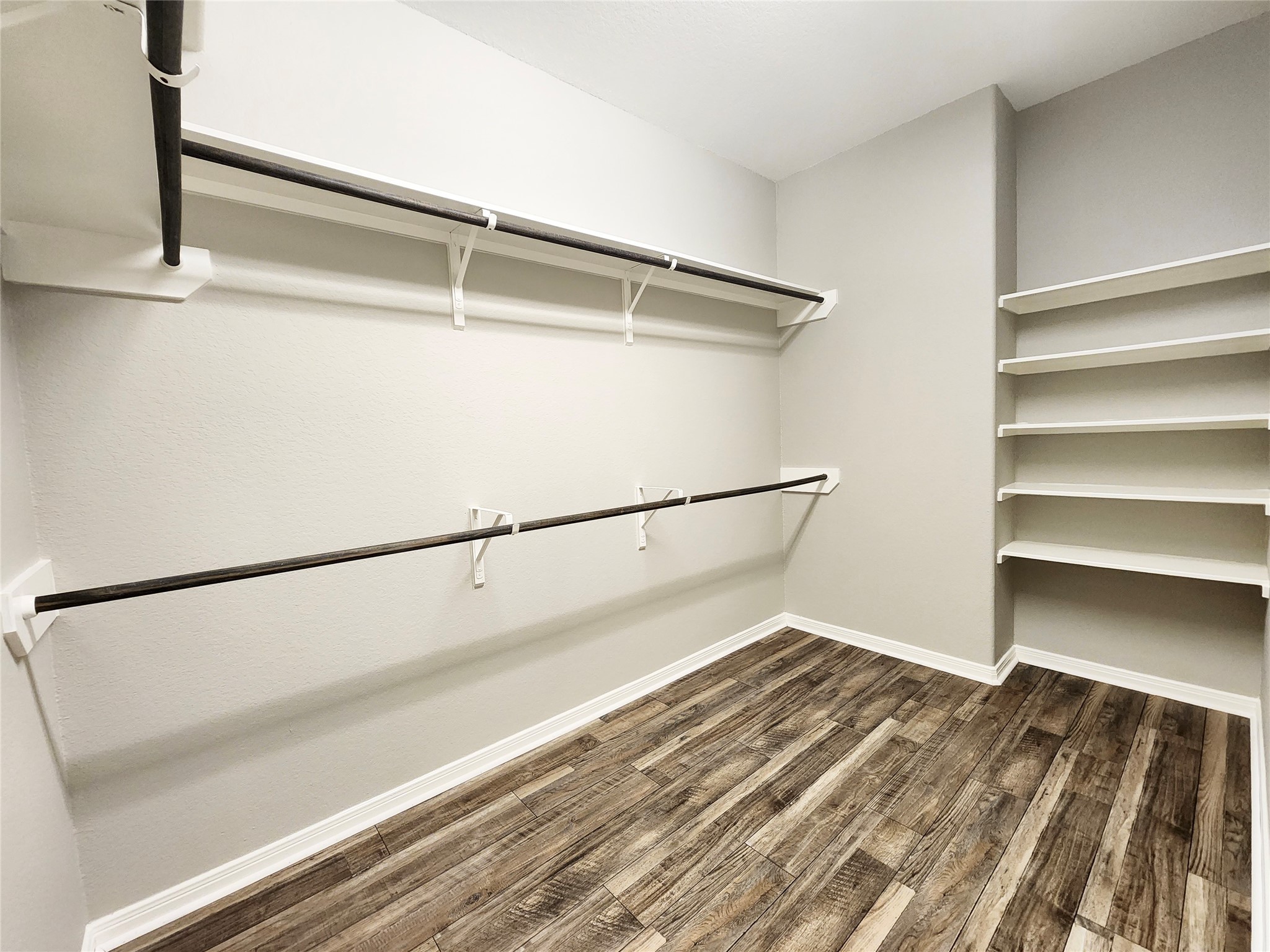 4407 Greenleaf Drive Spring, TX 77389 - Photo 15 of 29 a view of walk in closet with empty racks