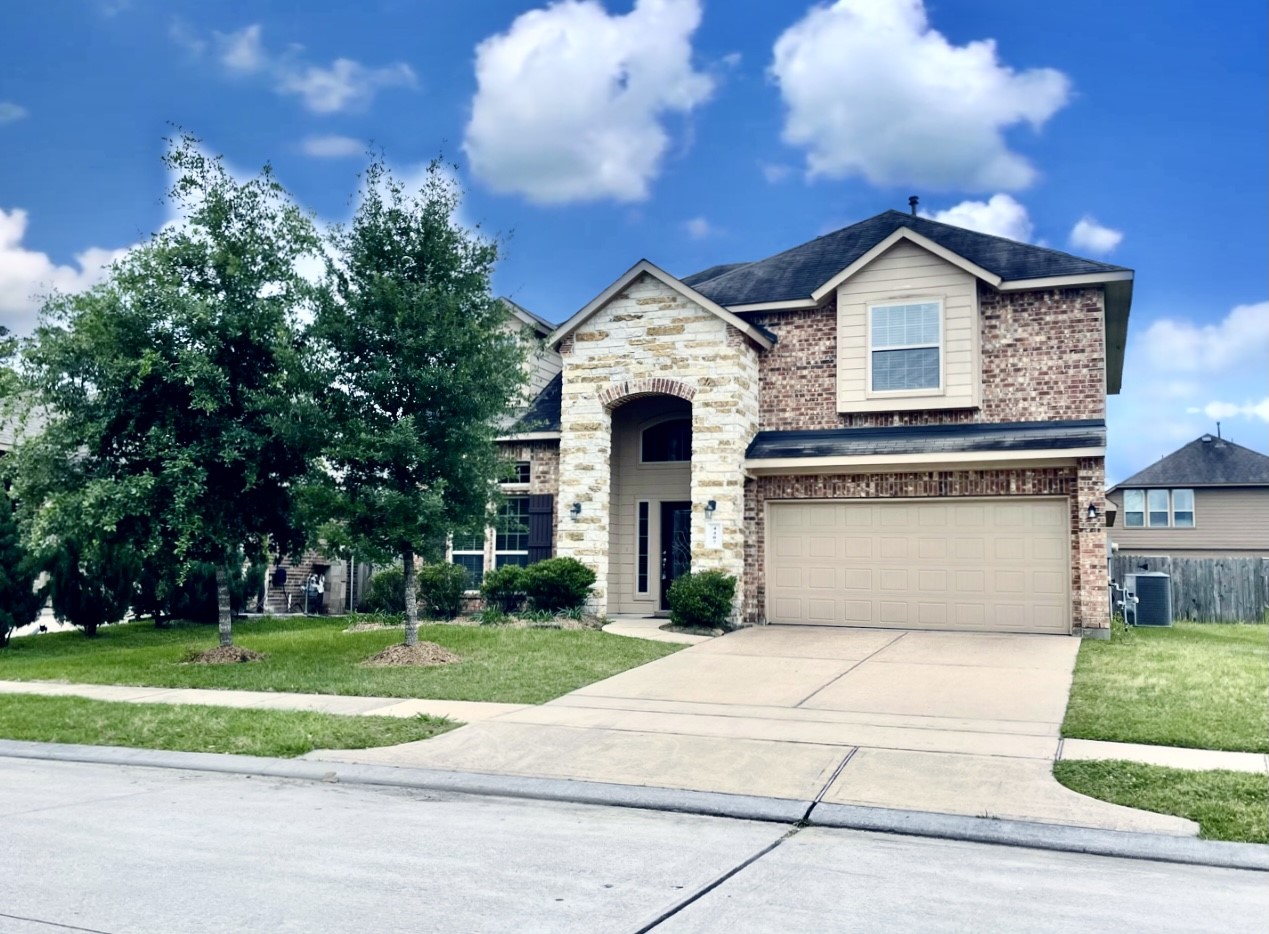 4407 Greenleaf Drive Spring, TX 77389 - Photo 2 of 29 a front view of house with yard and green space