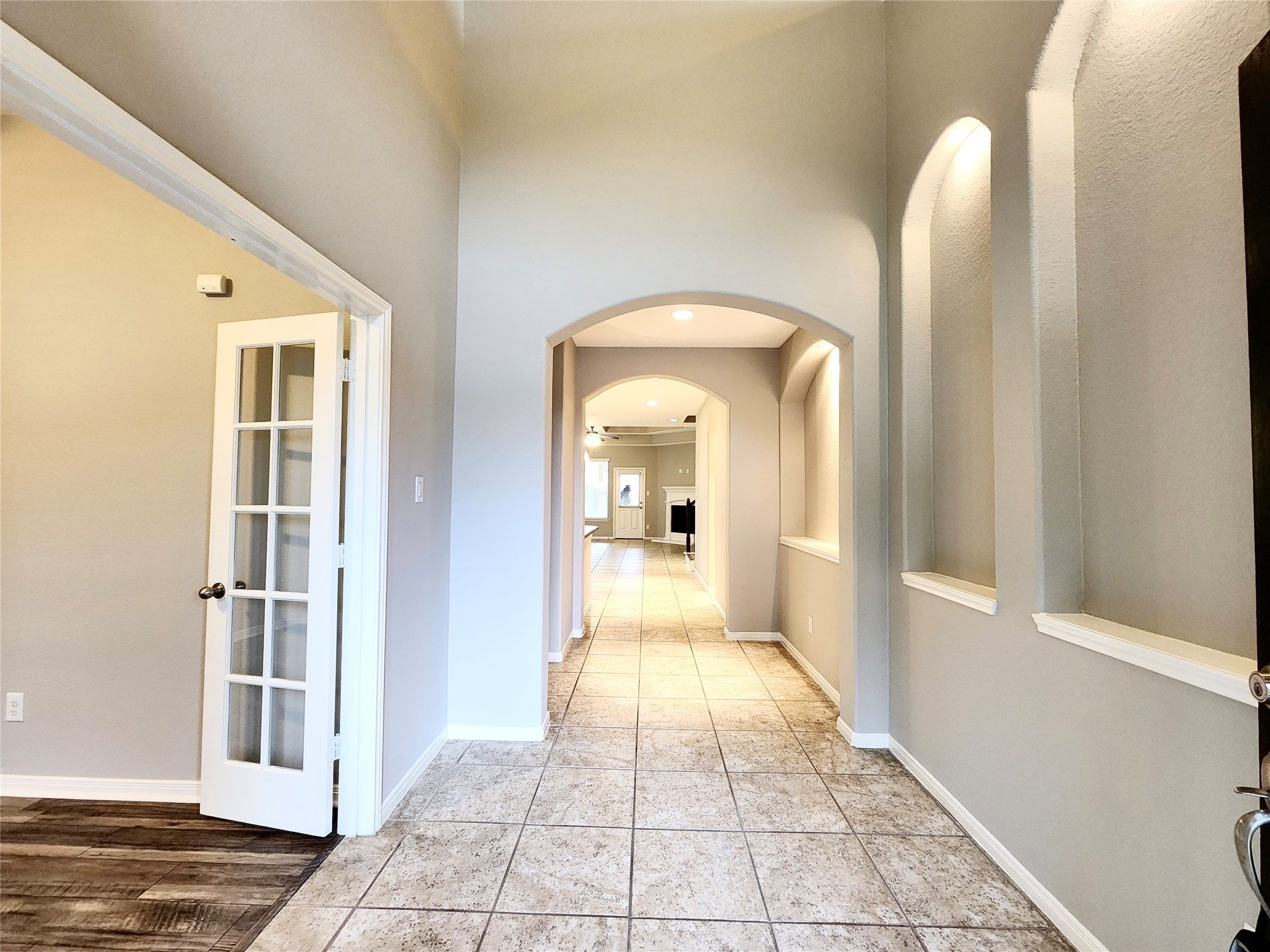4407 Greenleaf Drive Spring, TX 77389 - Photo 4 of 29 a view of a hallway with wooden floor and a living room