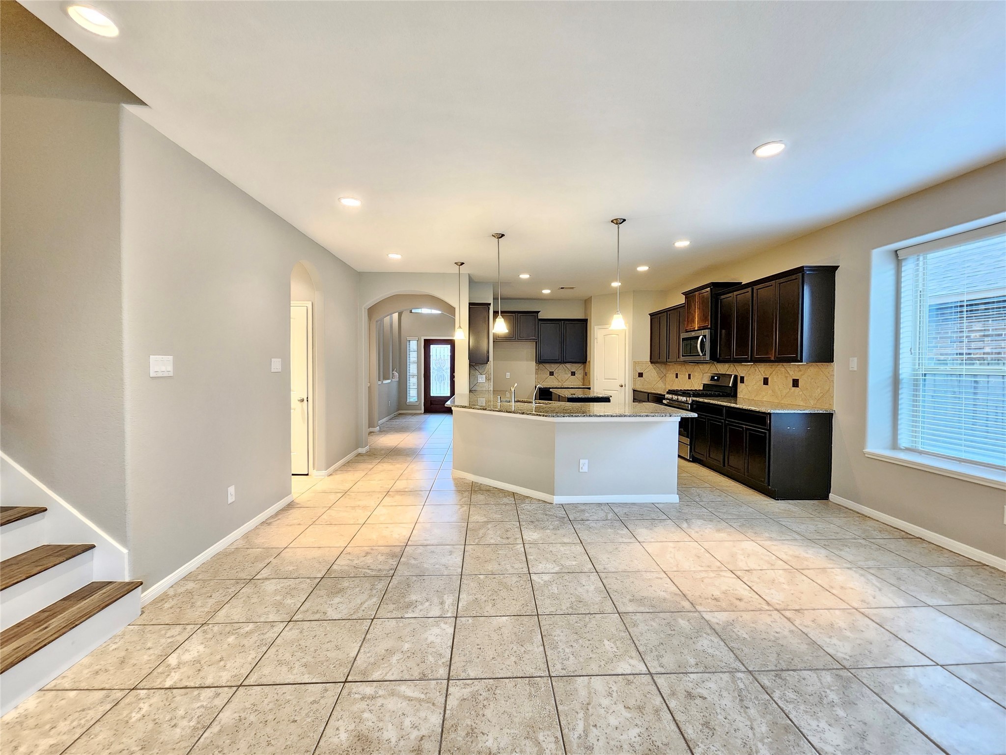 4407 Greenleaf Drive Spring, TX 77389 - Photo 8 of 29 a large kitchen with a large counter top stainless steel appliances and cabinets