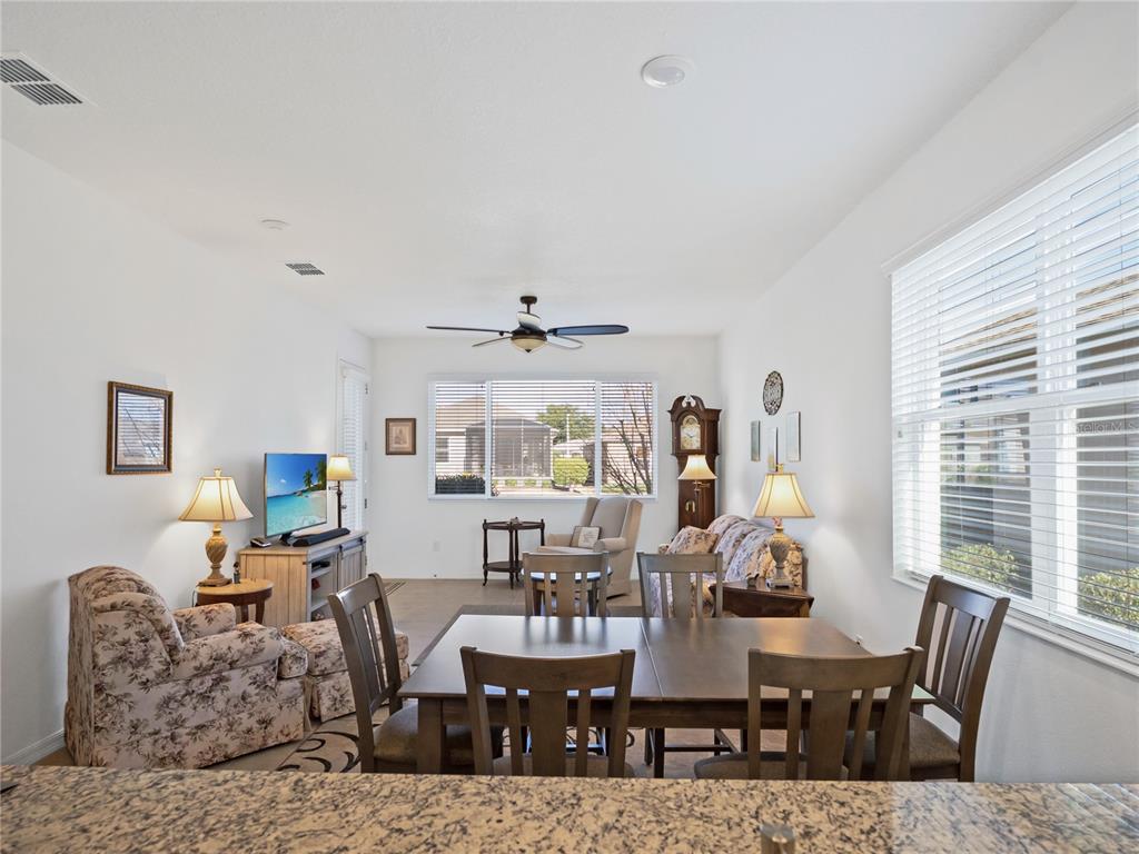 7832 Southwest 86th Loop Ocala, FL 34476 - Photo 20 of 40 a view of a dining room with furniture