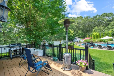 a view of a deck with furniture