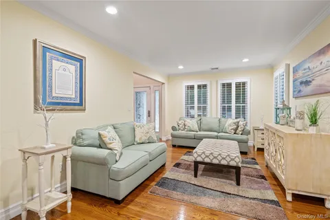 a living room with furniture and a table