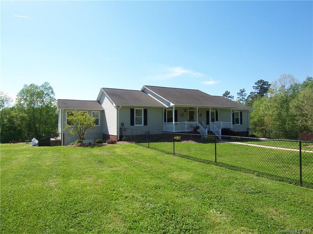 124 Laren Road Shelby, NC 28152 - Photo 1 of 30 a front view of house with a garden and trees