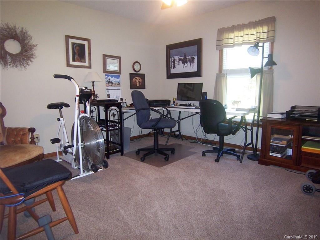 124 Laren Road Shelby, NC 28152 - Photo 19 of 30 a view of a livingroom with workspace and a window