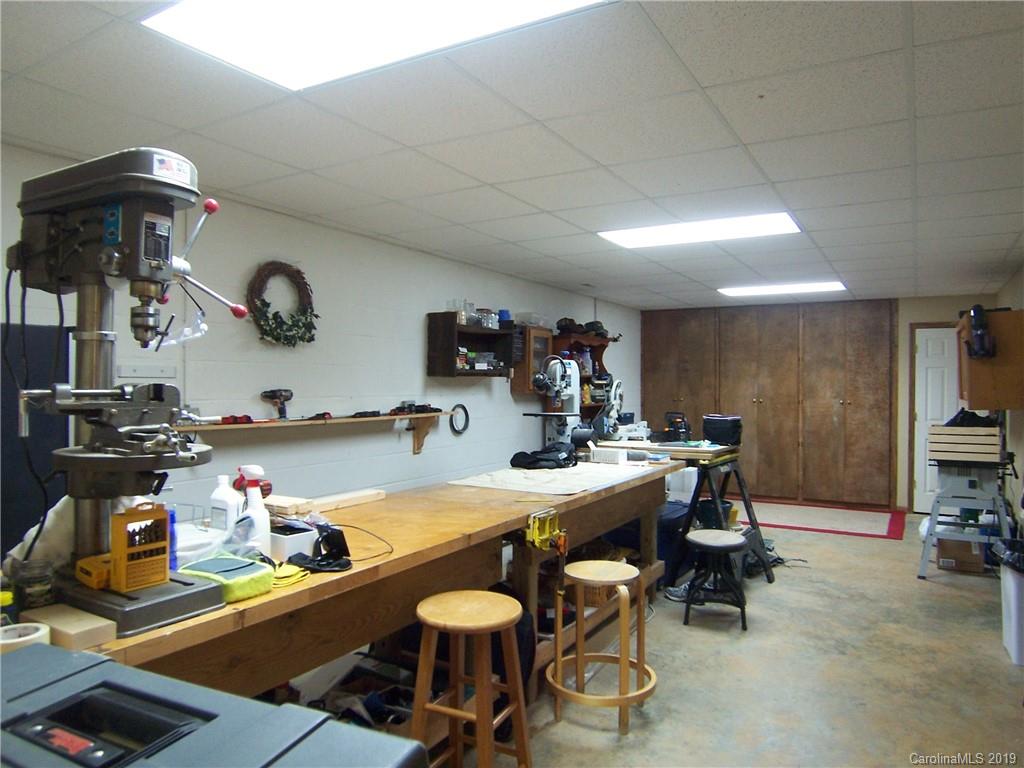 124 Laren Road Shelby, NC 28152 - Photo 23 of 30 a room with gym equipment and view of living room