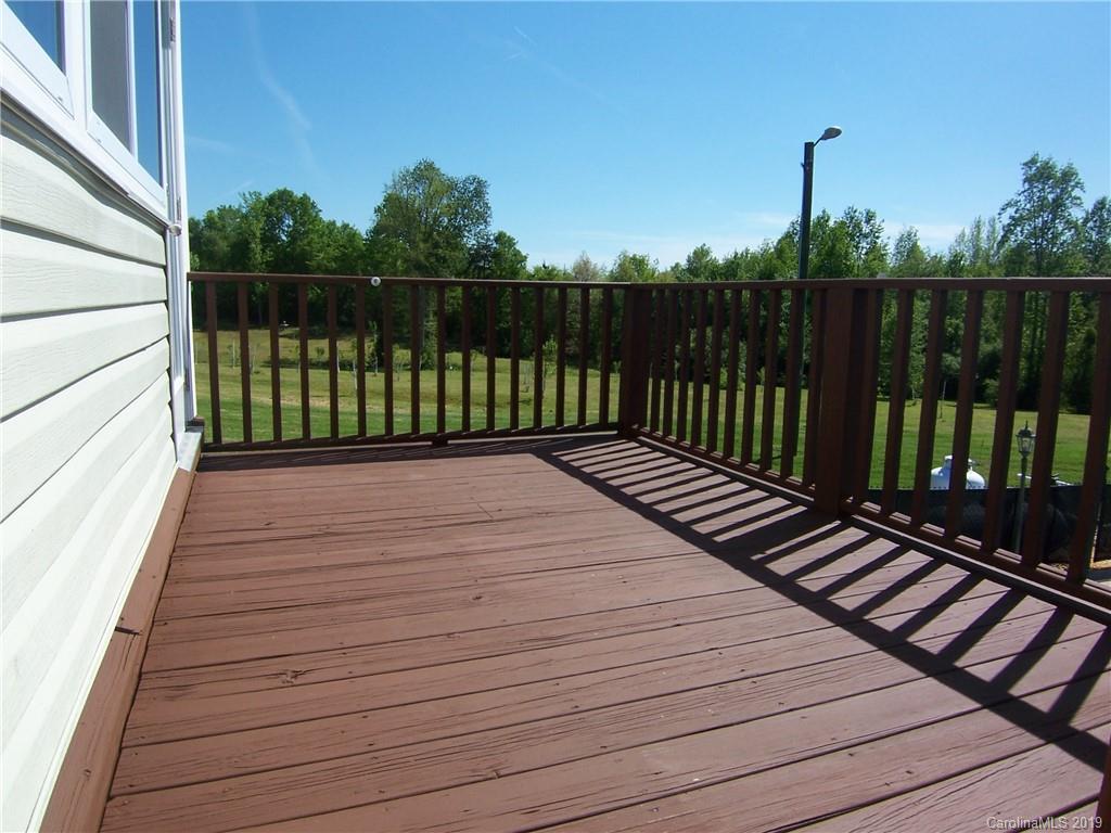 124 Laren Road Shelby, NC 28152 - Photo 24 of 30 a balcony with wooden floor