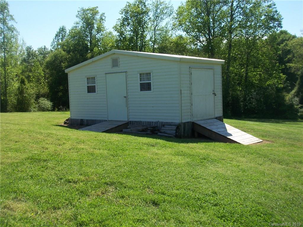 124 Laren Road Shelby, NC 28152 - Photo 29 of 30 a backyard of a house with lots of green space
