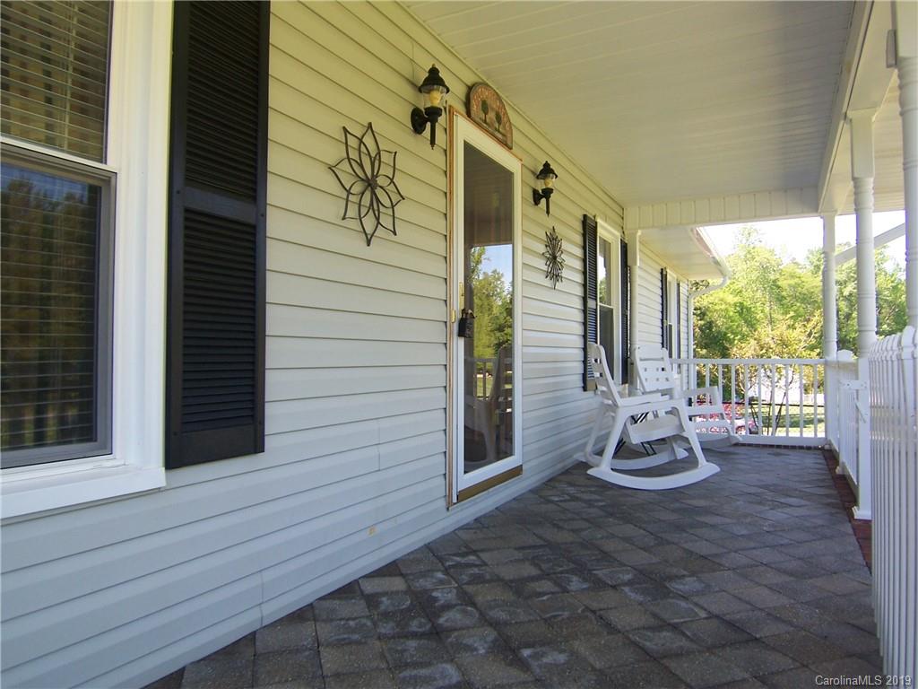124 Laren Road Shelby, NC 28152 - Photo 5 of 30 a view of a chair with couch in the balcony