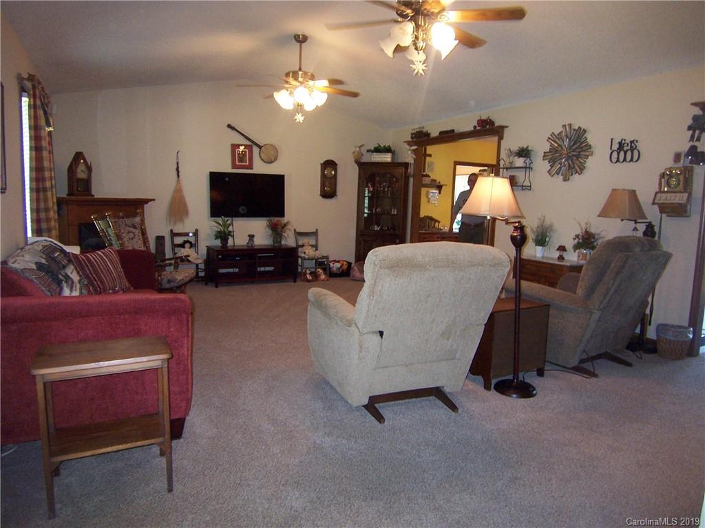 124 Laren Road Shelby, NC 28152 - Photo 7 of 30 a living room with furniture and a flat screen tv