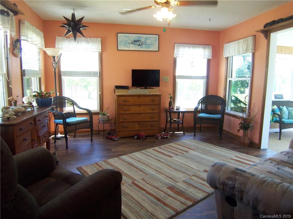 124 Laren Road Shelby, NC 28152 - Photo 9 of 30 a living room with furniture and a flat screen tv