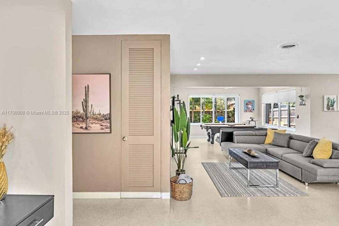 4316 Garfield Street Hollywood, FL 33021 - Photo 30 of 36 a living room with furniture and a large window
