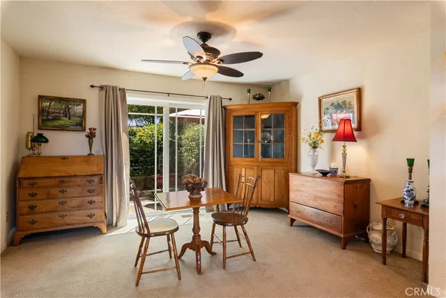 a view of a dinning table and chairs in the kitchen