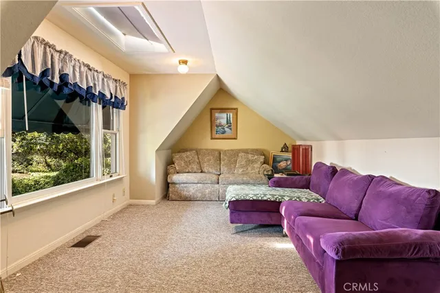 a backyard of a house with barbeque oven