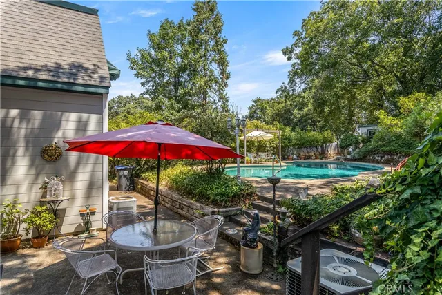 an aerial view of lake with residential houses with outdoor space and ocean view
