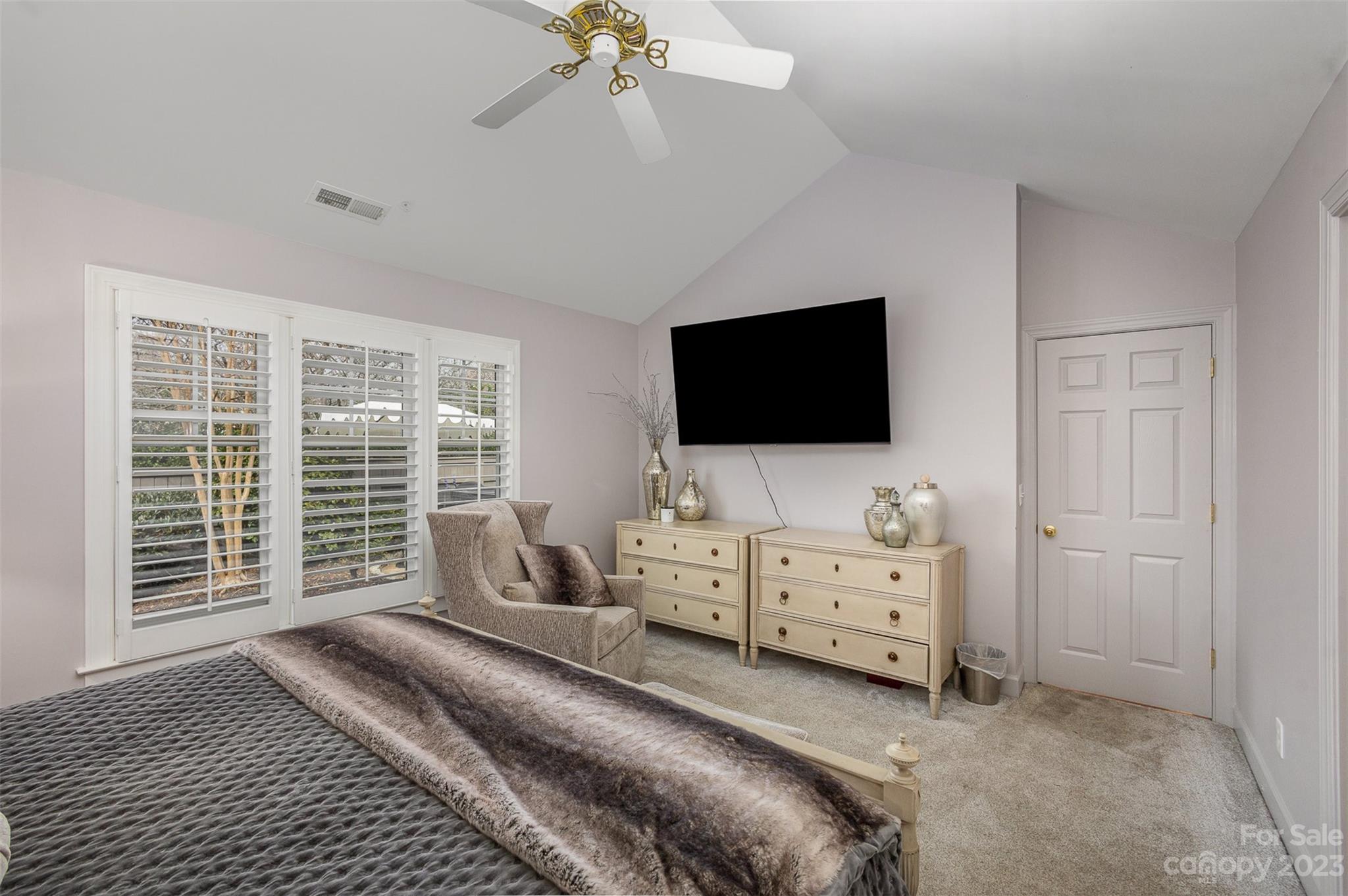 331 Sloane Square Way Charlotte, NC 28211 - Photo 18 of 28 a bedroom with furniture and flat screen tv