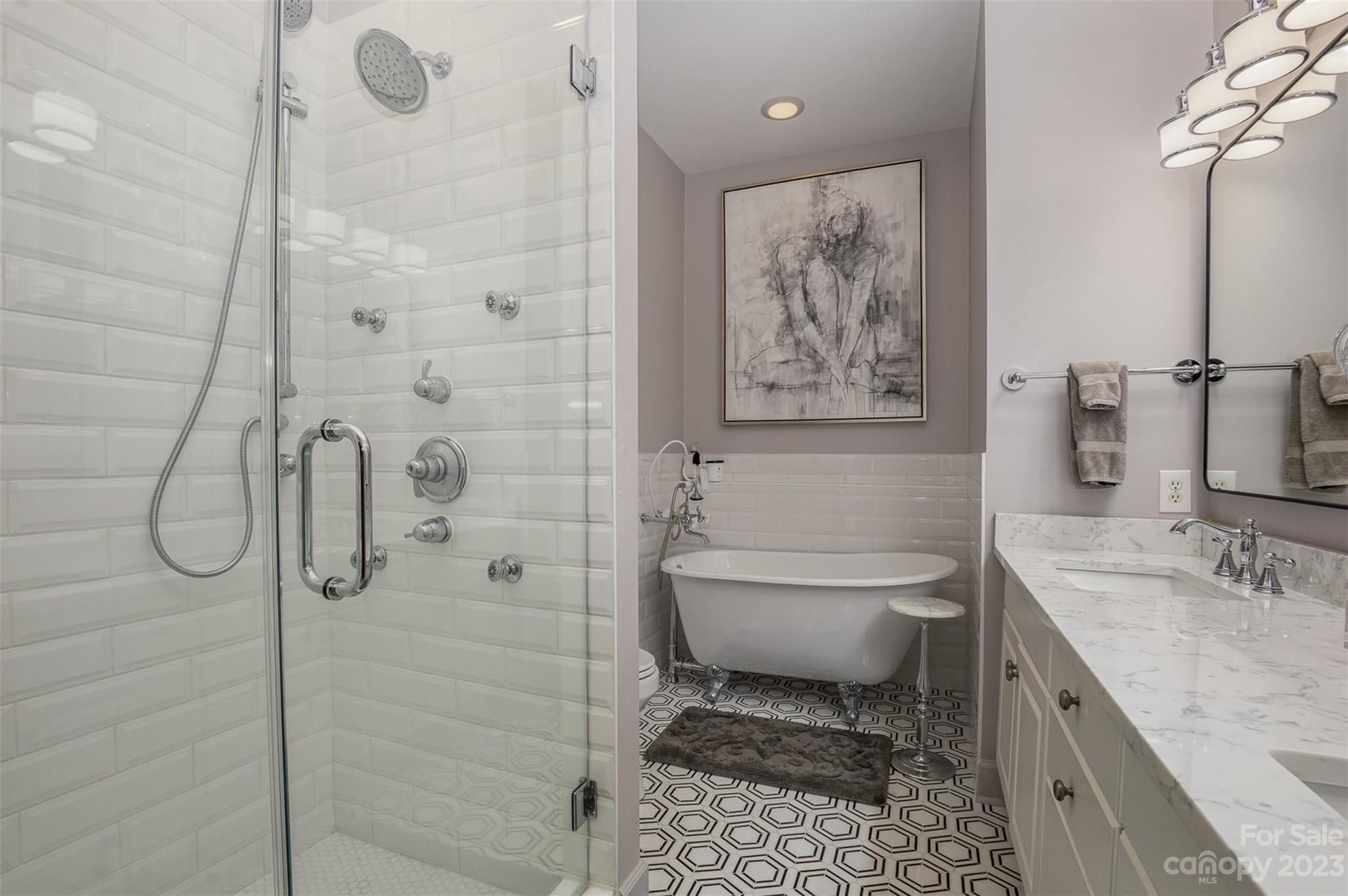 331 Sloane Square Way Charlotte, NC 28211 - Photo 19 of 28 a bathroom with a sink toilet and shower