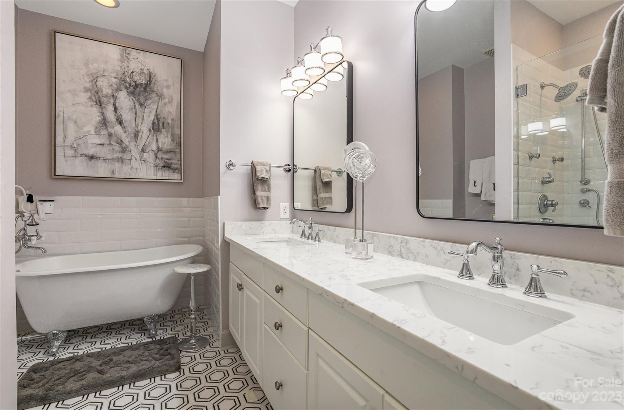 331 Sloane Square Way Charlotte, NC 28211 - Photo 20 of 28 a bathroom with a double vanity sink mirror and toilet