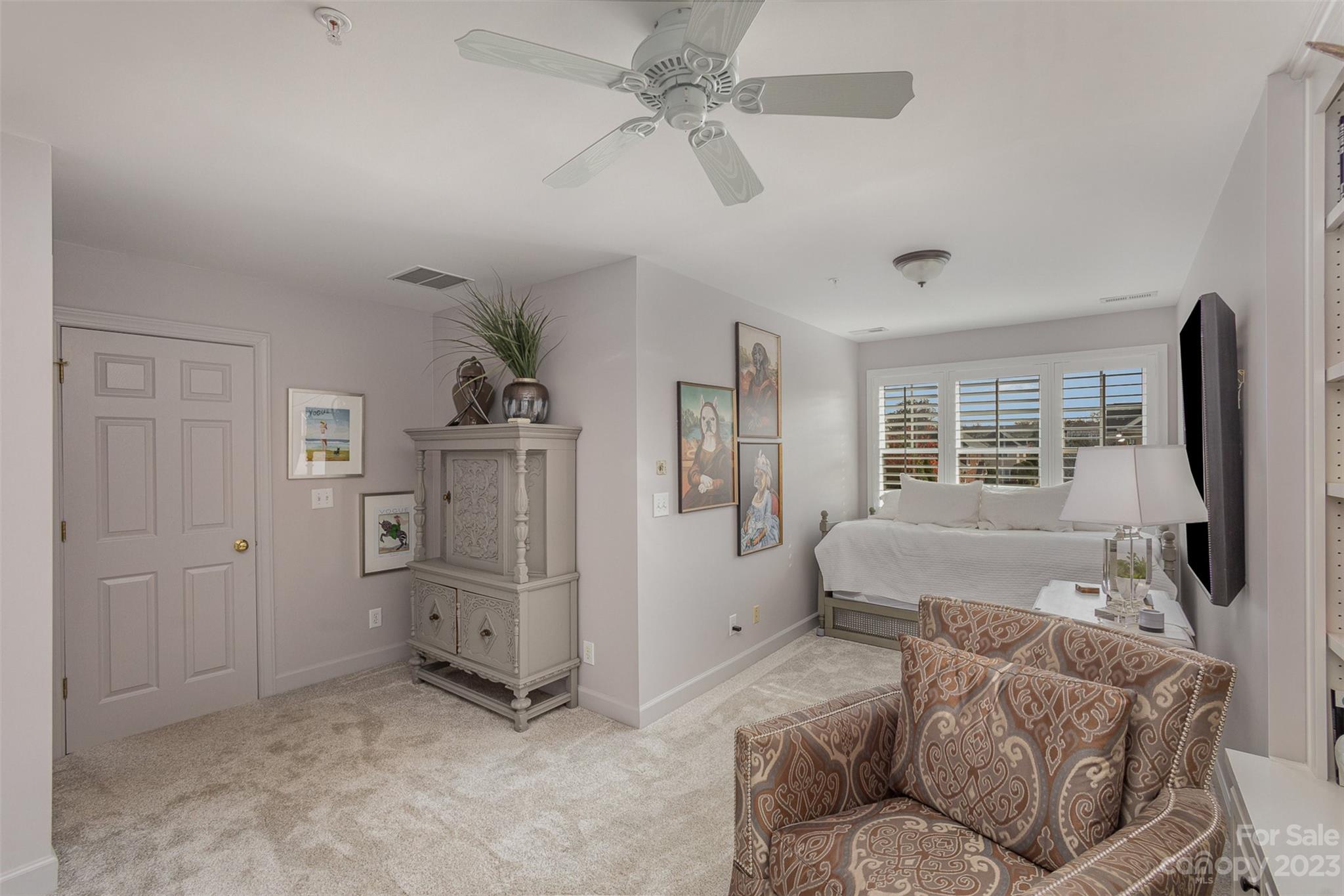 331 Sloane Square Way Charlotte, NC 28211 - Photo 24 of 28 a living room with furniture and a flat screen tv