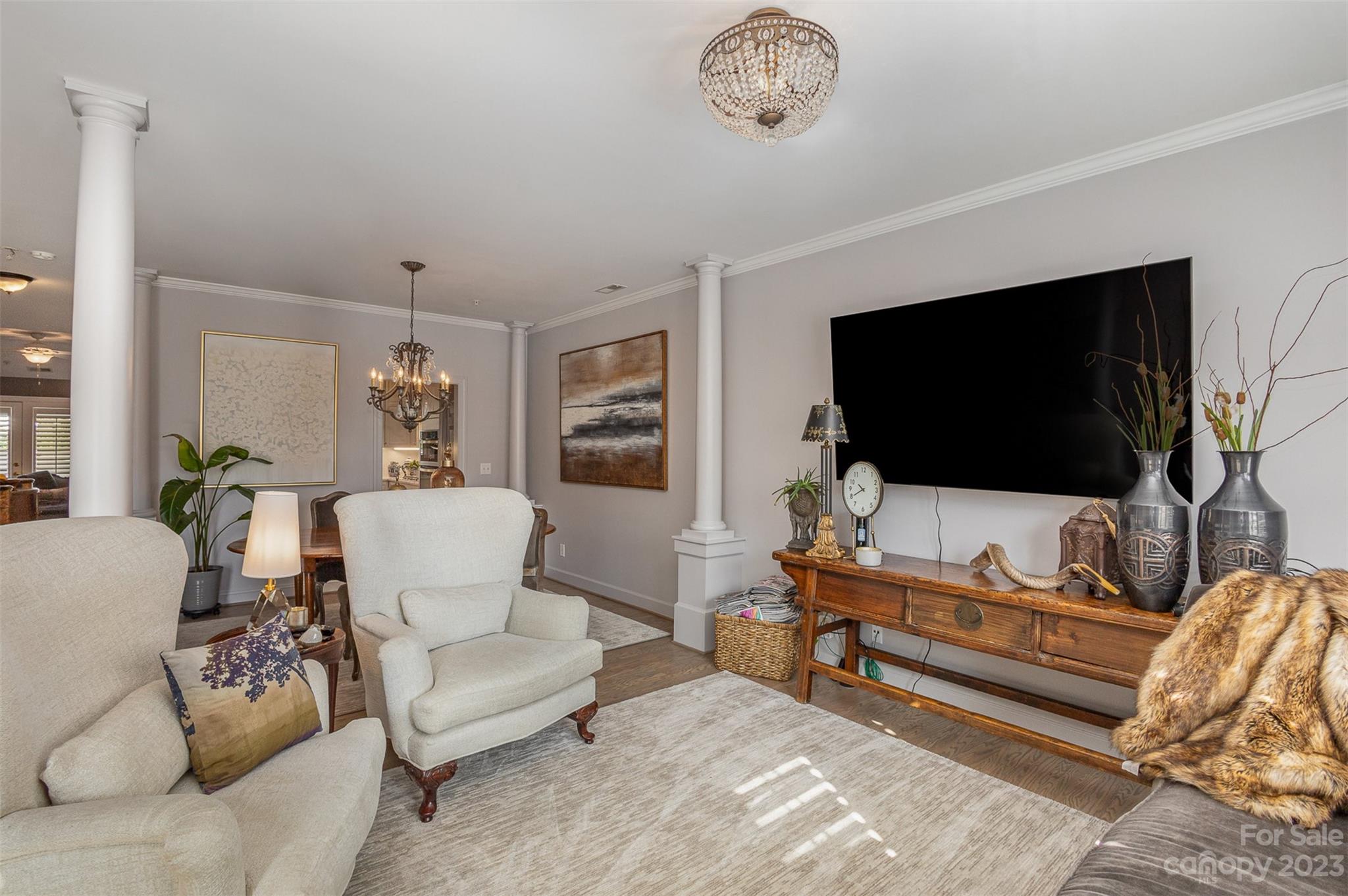 331 Sloane Square Way Charlotte, NC 28211 - Photo 6 of 28 a living room with furniture and a flat screen tv