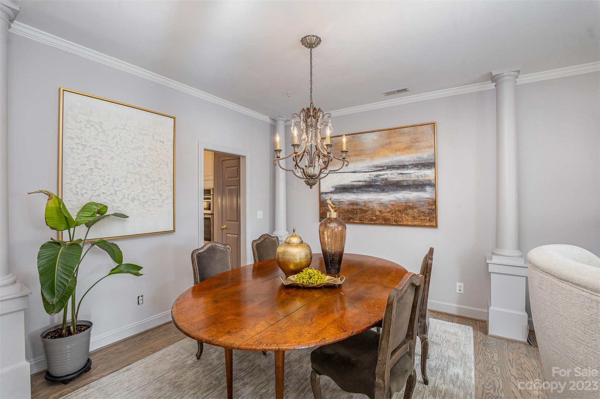 331 Sloane Square Way Charlotte, NC 28211 - Photo 8 of 28 a view of a dining room with furniture window and wooden floor