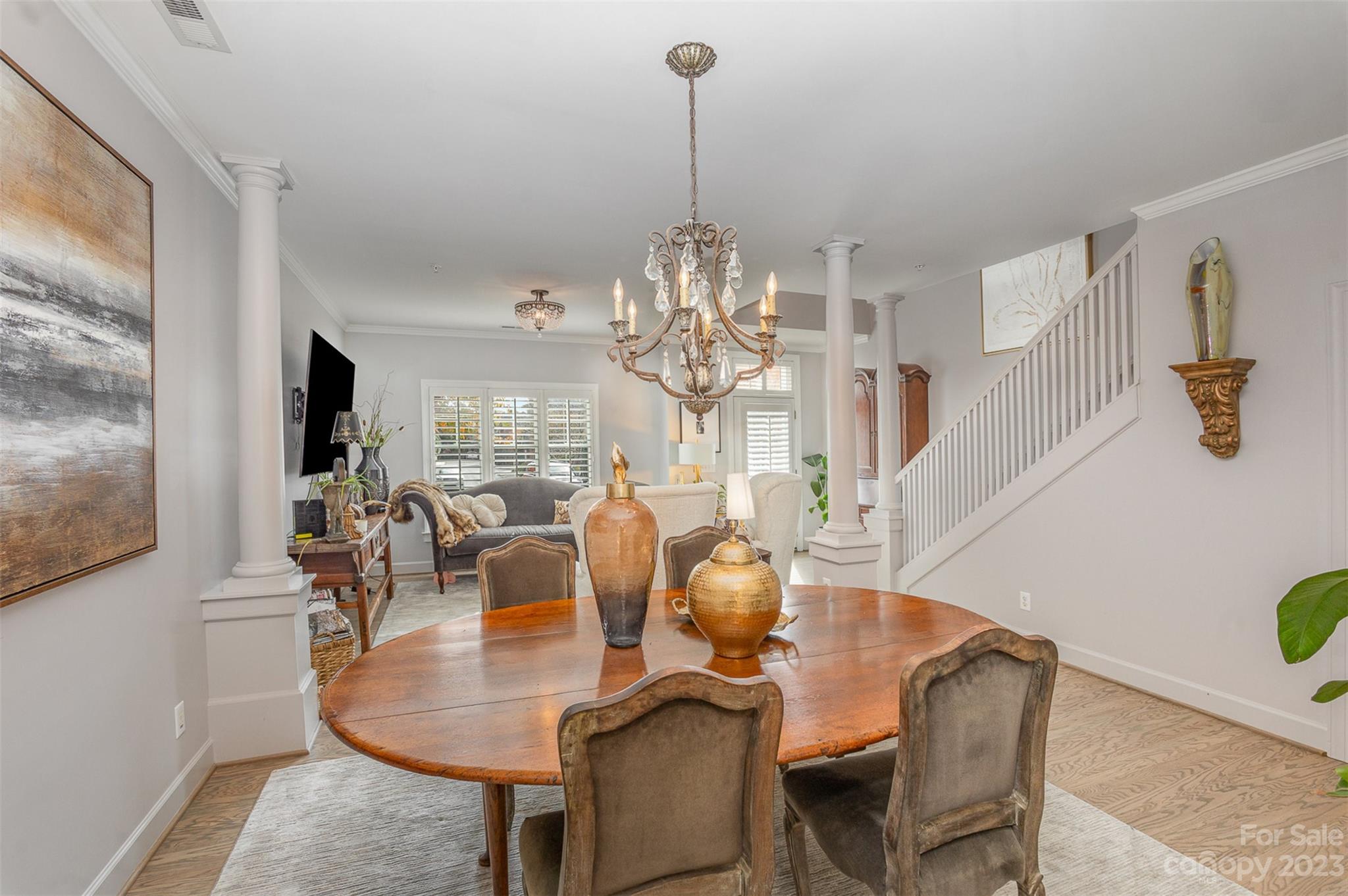 331 Sloane Square Way Charlotte, NC 28211 - Photo 9 of 28 a view of a dining room with furniture and wooden floor
