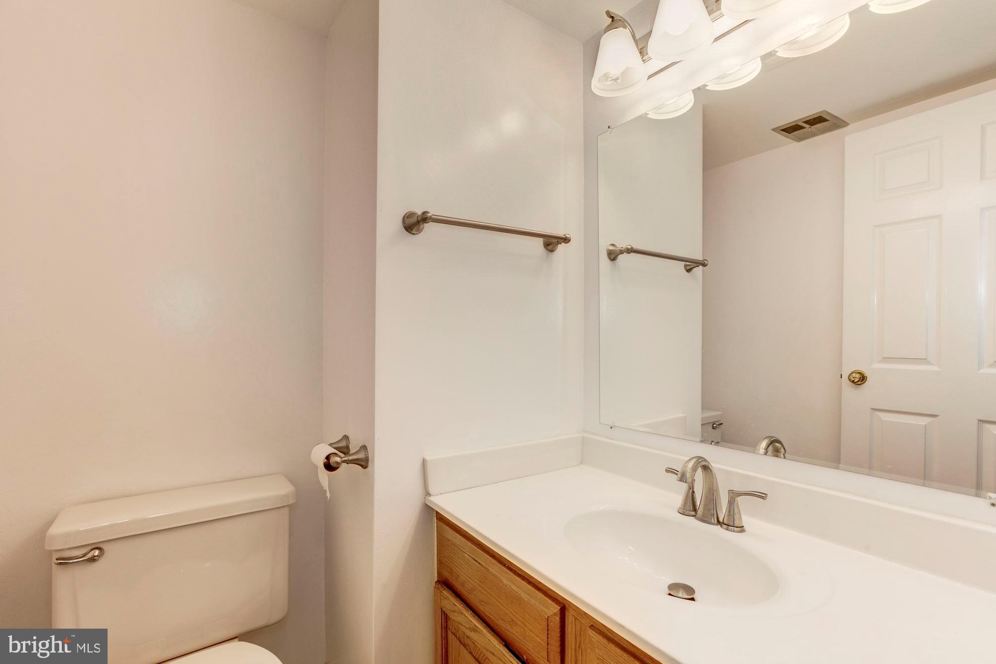 14518 MacBeth Drive Silver Spring, MD 20906 - Photo 21 of 43 a bathroom with a sink a toilet and shower