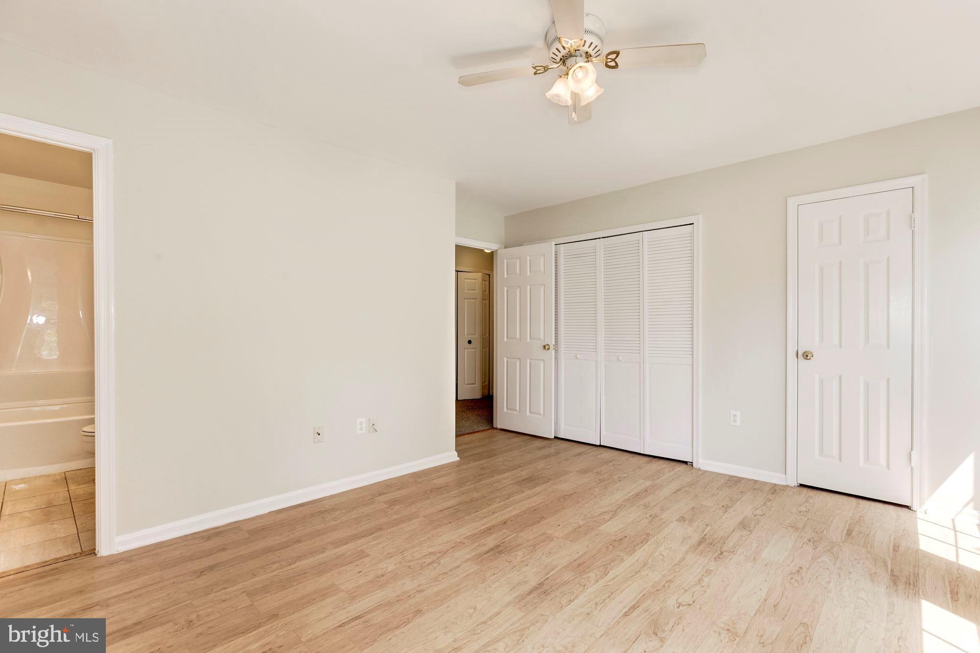 14518 MacBeth Drive Silver Spring, MD 20906 - Photo 25 of 43 a view of empty room with wooden floor