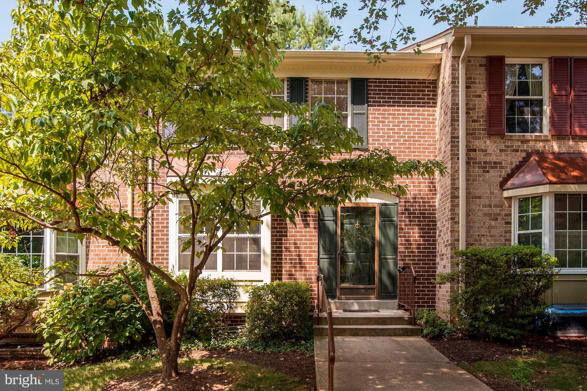 14518 MacBeth Drive Silver Spring, MD 20906 - Photo 39 of 43 front view of a house with a small yard