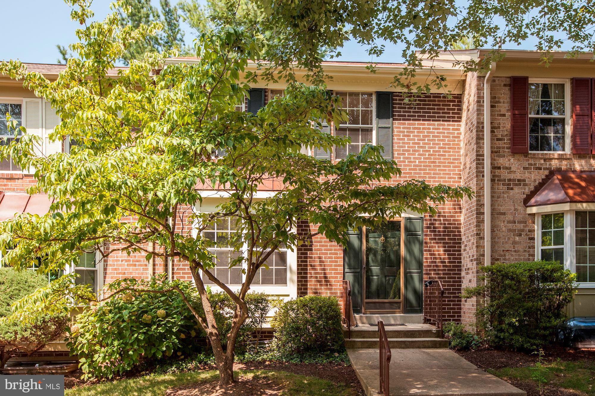 14518 MacBeth Drive Silver Spring, MD 20906 - Photo 40 of 43 a front view of a house with a tree