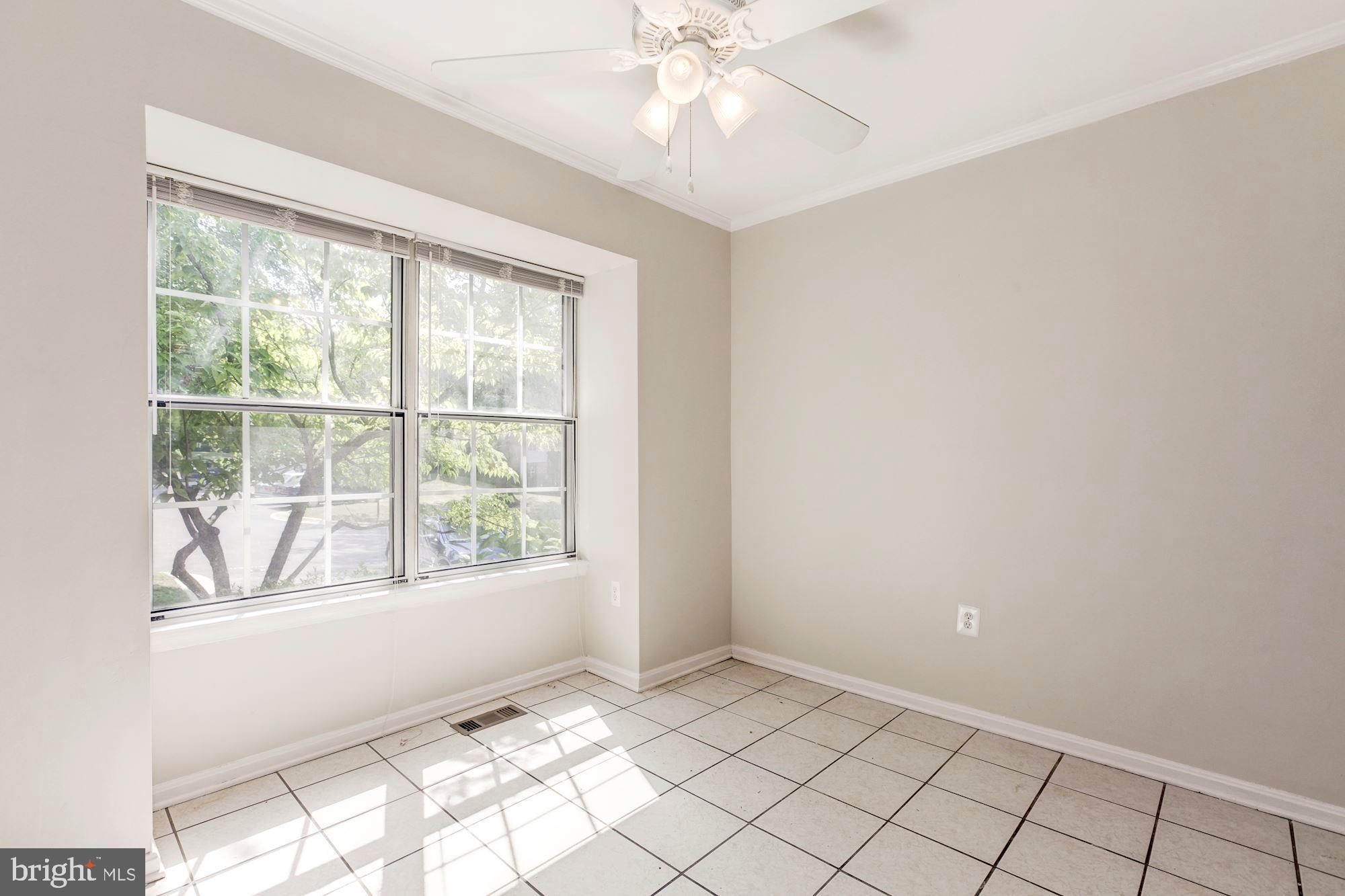 14518 MacBeth Drive Silver Spring, MD 20906 - Photo 6 of 43 a view of an empty room with a window