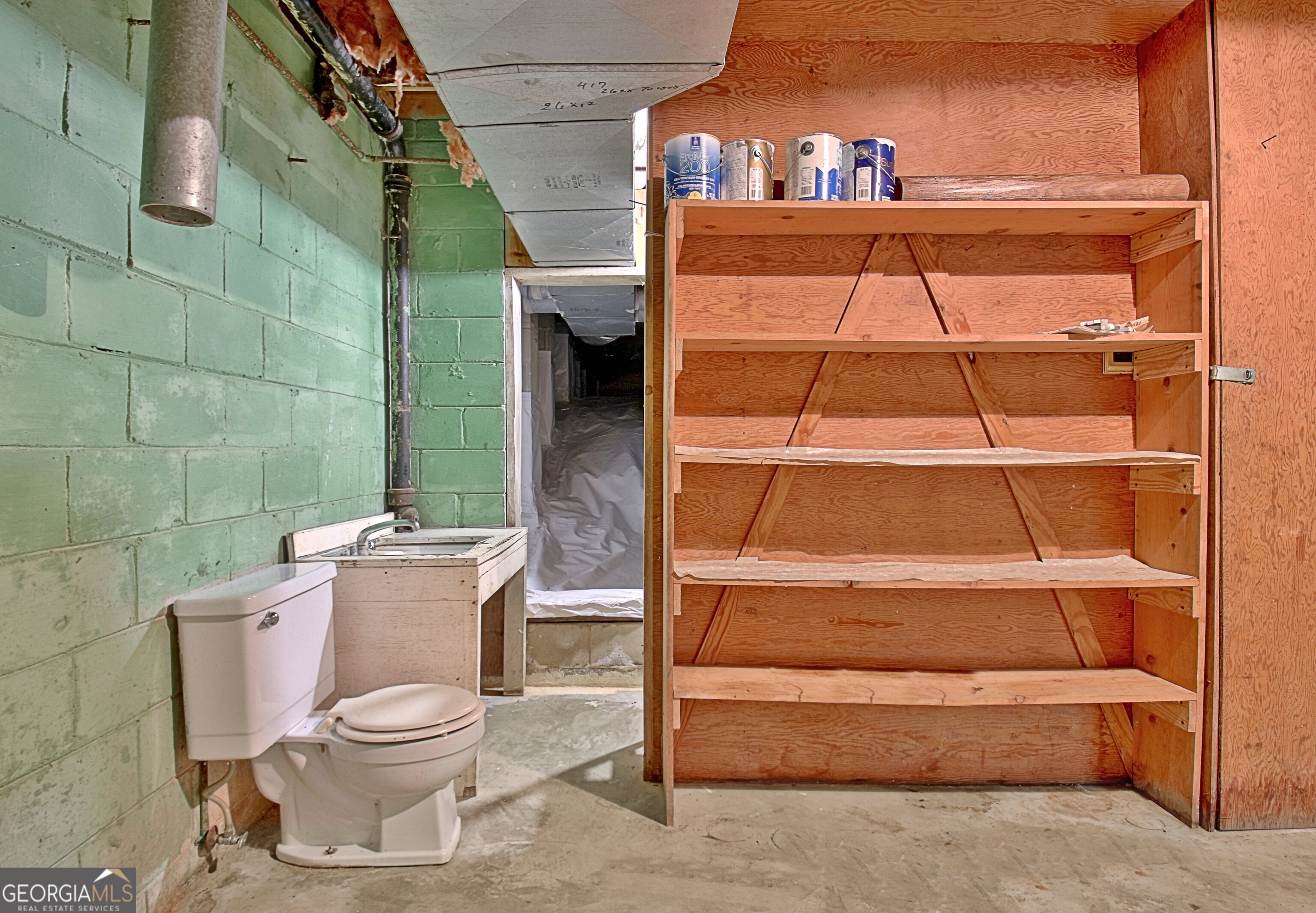 717 Tyrone Road Tyrone, GA 30290 - Photo 32 of 58 a bathroom with a toilet and a shower