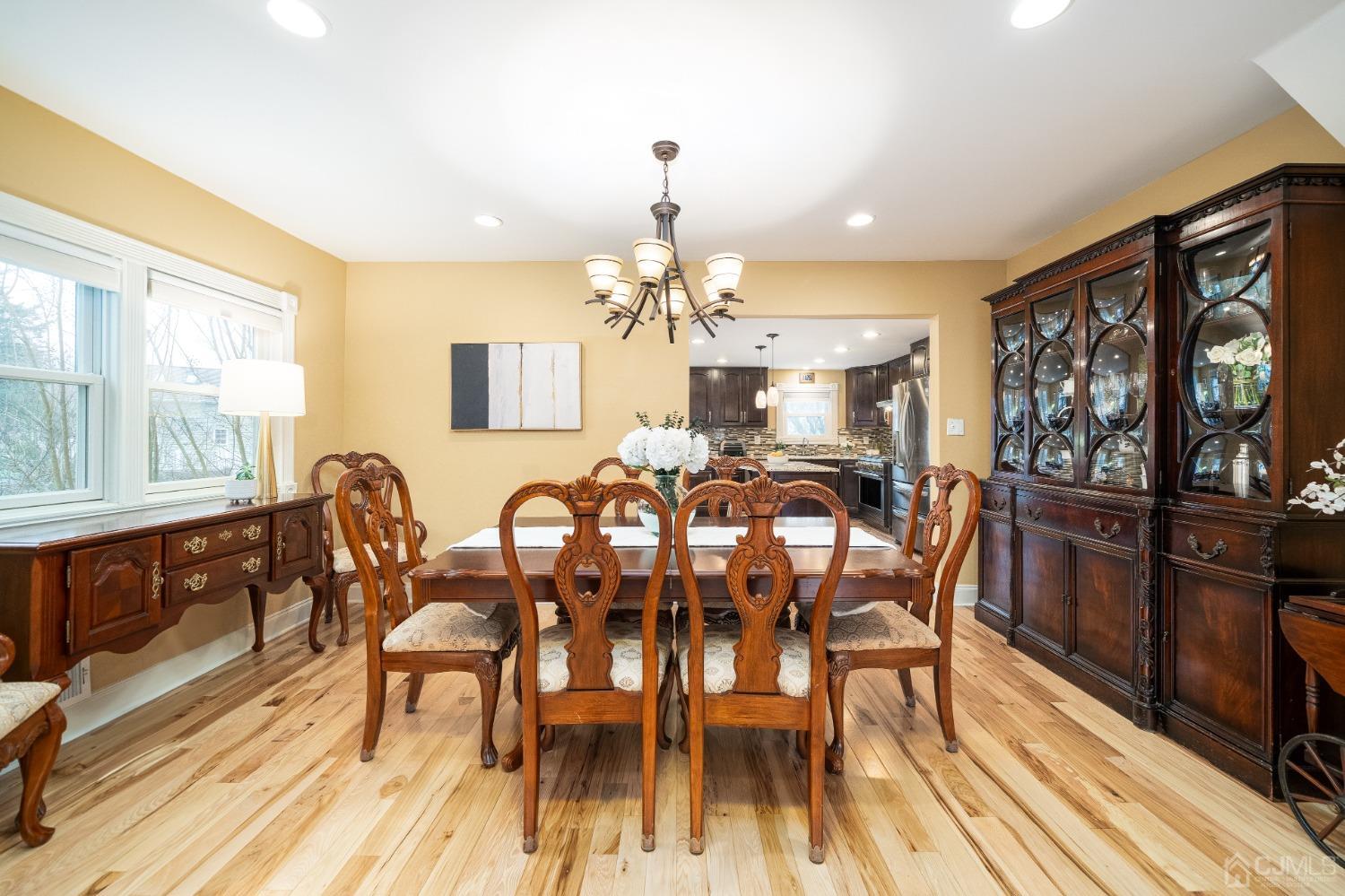 241 McFarlane Road Colonia, NJ 07067 - Photo 5 of 60 a view of a dining room with furniture window and wooden floor