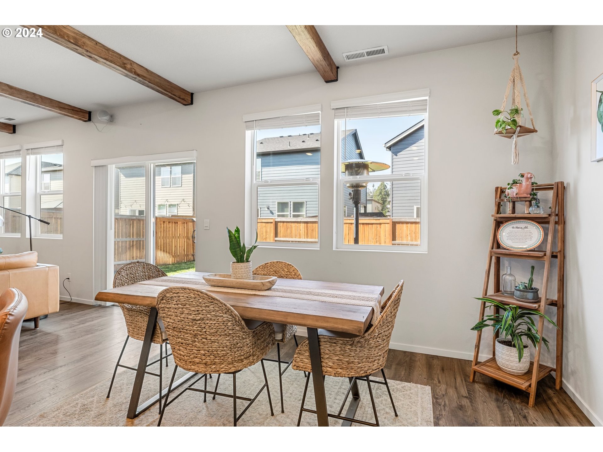 2984 Fenya Street Springfield, OR 97477 - Photo 11 of 31 a view of a dining room with furniture wooden floor and a window