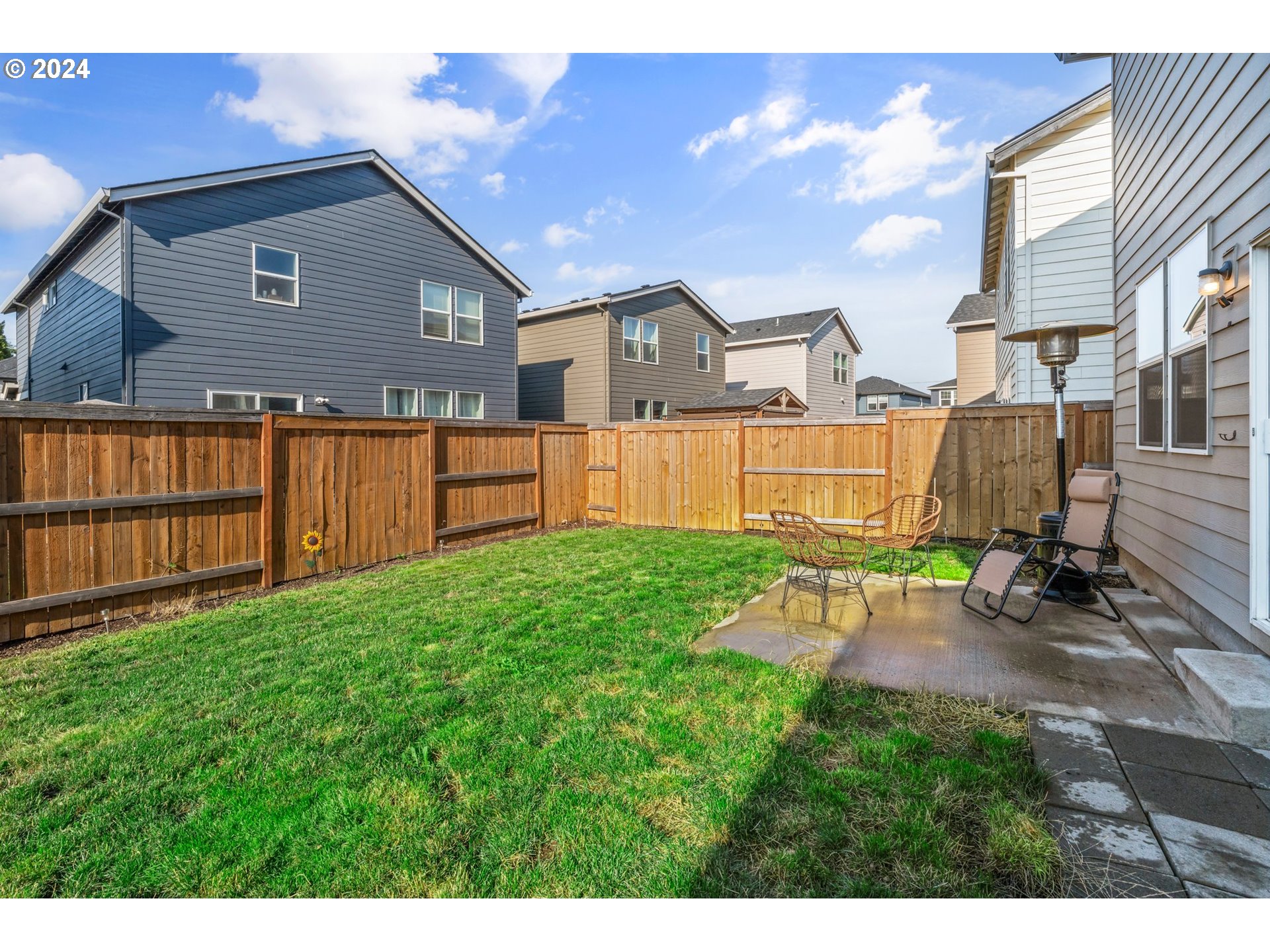 2984 Fenya Street Springfield, OR 97477 - Photo 30 of 31 a view of backyard with a garden and deck