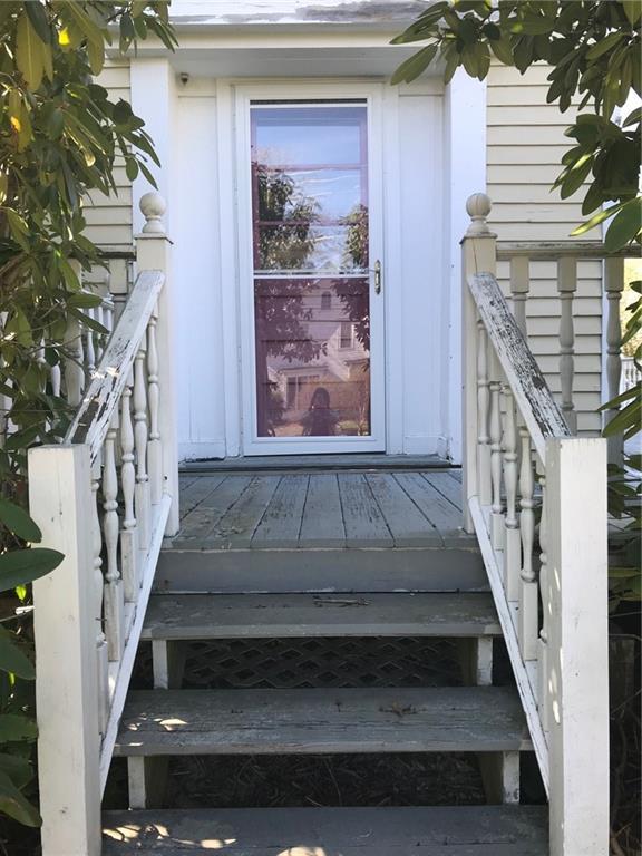 89 Main Street St. George, ME 04860 - Photo 2 of 30 Front door with canopy of Rhododendrons.