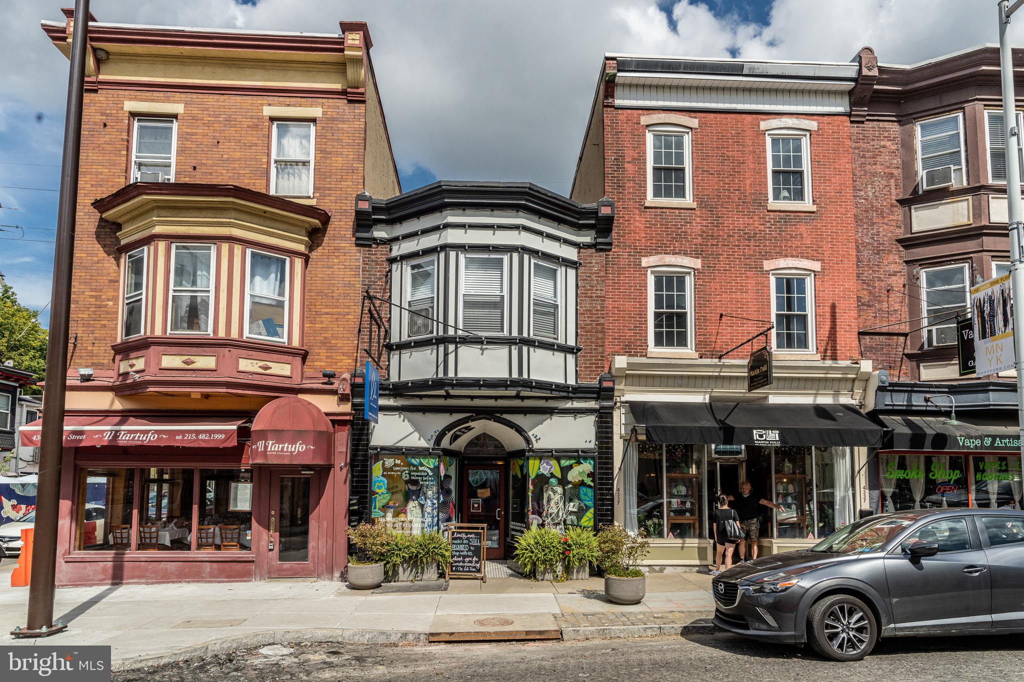 a car parked in front of a building
