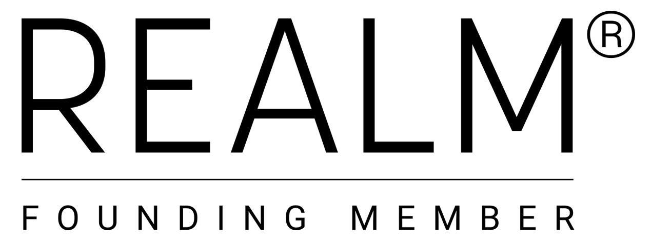 A blurry photo of a dark room with a black and white background.