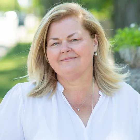 Anne Lenzini, Agent in  - Compass