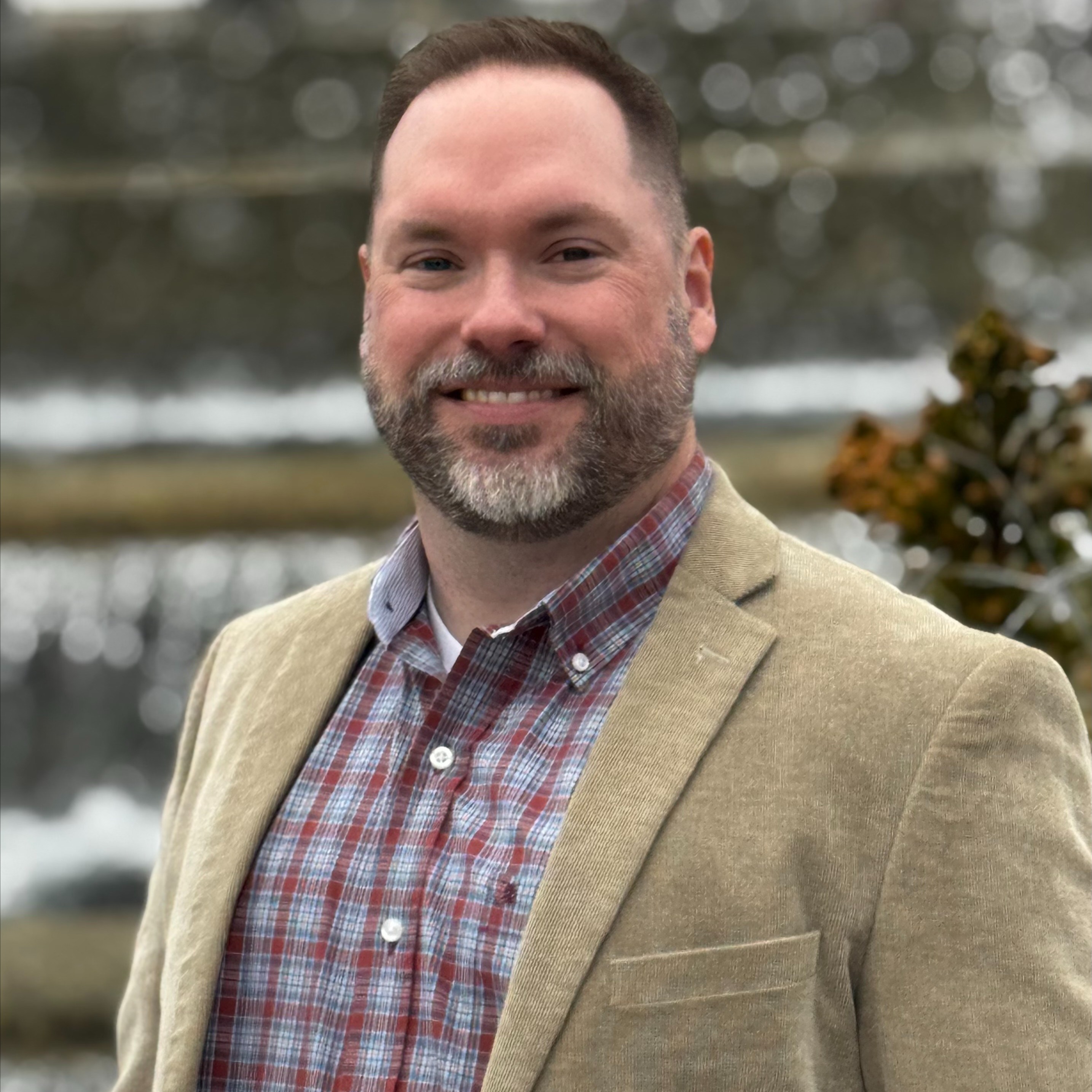 Headshot of Adam Lloyd