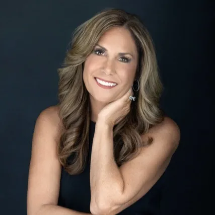 Molly Ferro, Agent in  - Compass