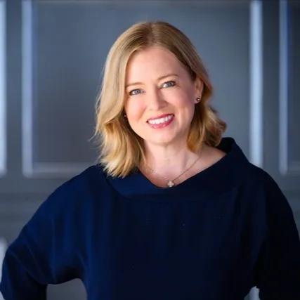 Laura Amin, Agent in  - Compass