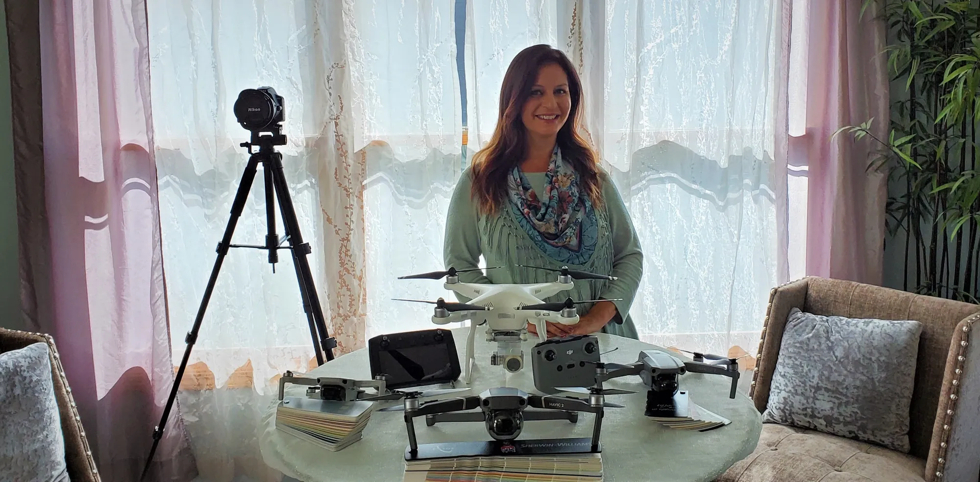 A woman standing in front of a camera