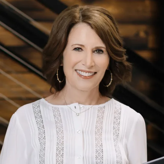 Janis Zagoria, Agent in  - Compass