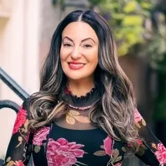 Dalia Katos, Agent in  - Compass