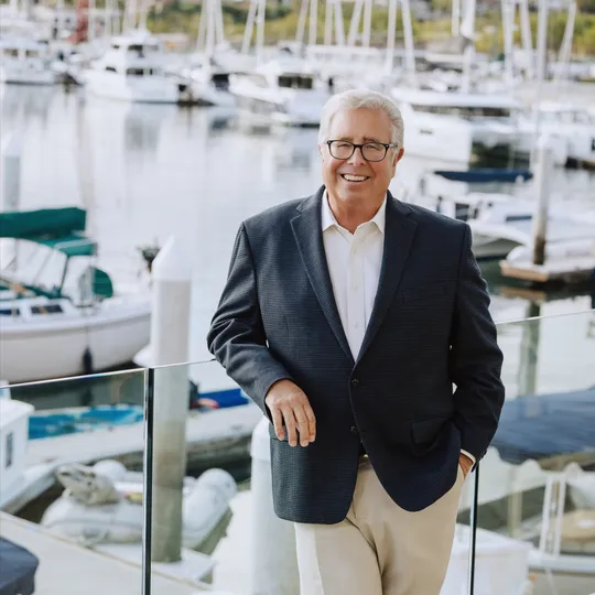 Dean Lueck, Agent in  - Compass